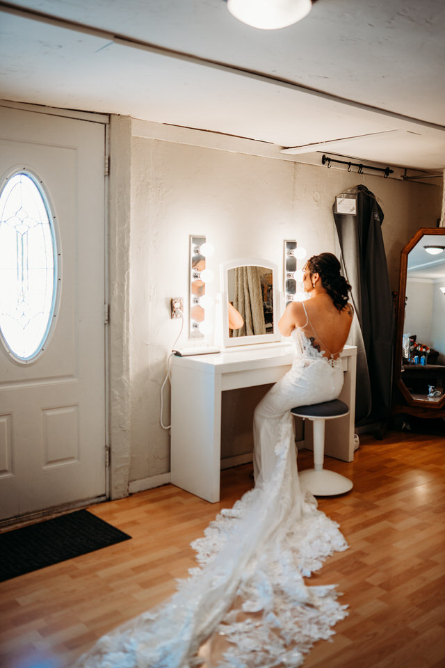 Bride getting ready at Boojum Tree Hidden Gardens