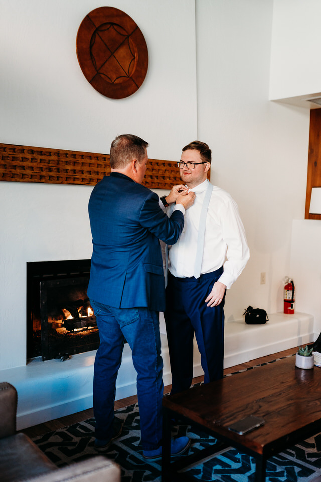 Groom getting ready for elopement