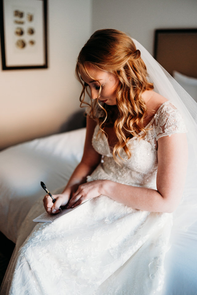 Bride writing vows