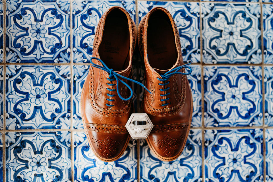 Grooms wedding shoes and rings