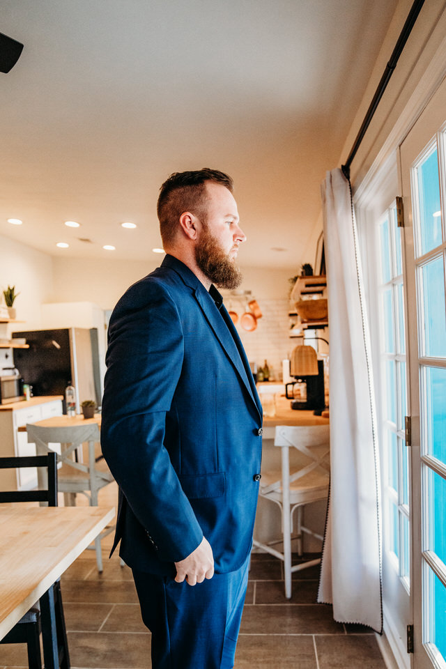 Groom getting ready for elopement