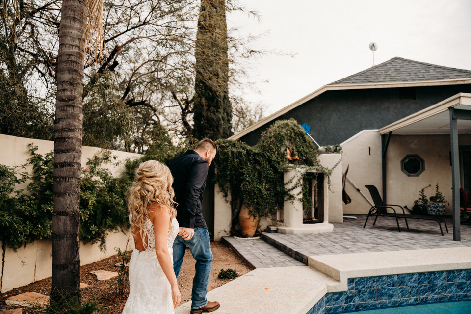 Bride and groom walking to Airbnb