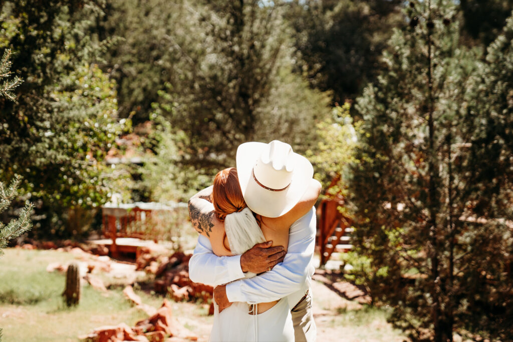 An intentional Arizona desert elopement capturing a sunset ridge first dance and off road adventure.