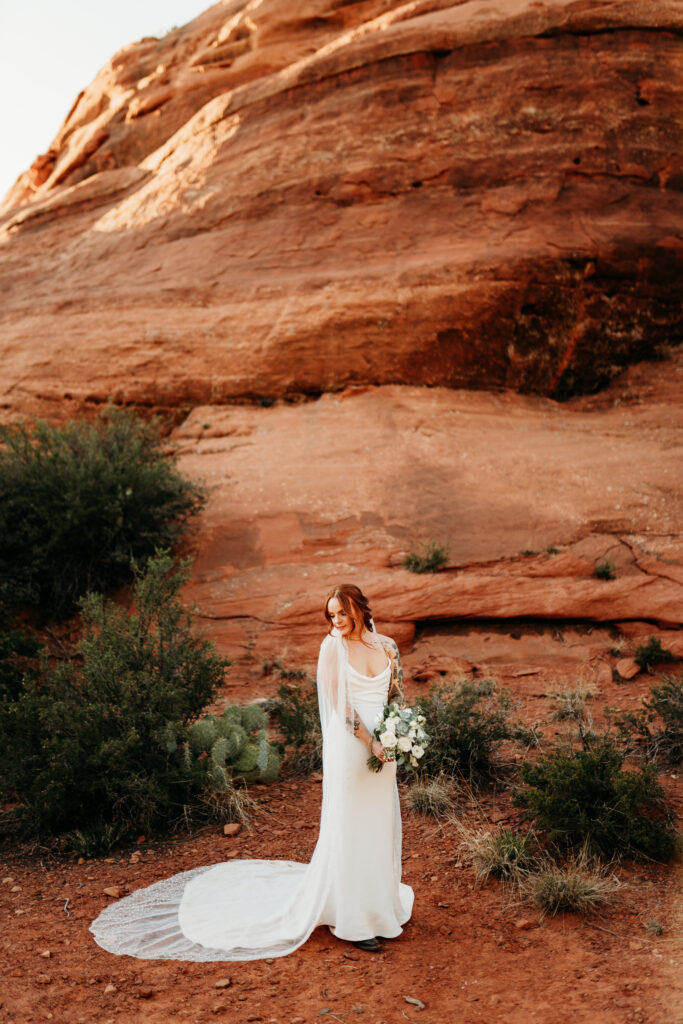 An intentional Arizona desert elopement capturing a sunset ridge first dance and off road adventure.