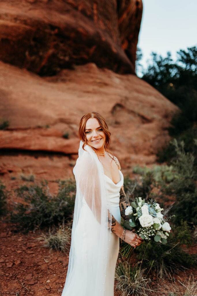 An intentional Arizona desert elopement capturing a sunset ridge first dance and off road adventure.