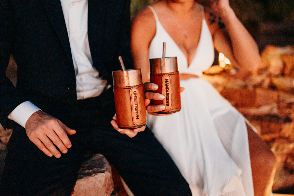 A Deadhorse Point elopement with a relaxed evening timeline, vineyard portraits, and an intimate sunset ceremony overlooking the canyon.