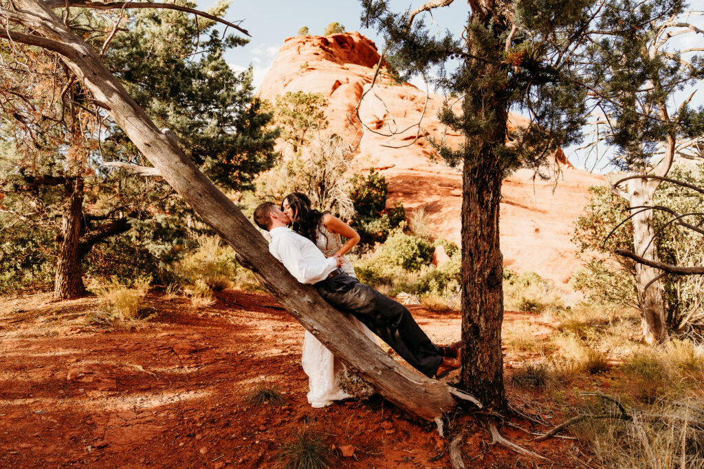 A Sedona adventure elopement featuring a sunrise hike, off-road Jeep experience, and sunset at Merry Go Round Rock.
