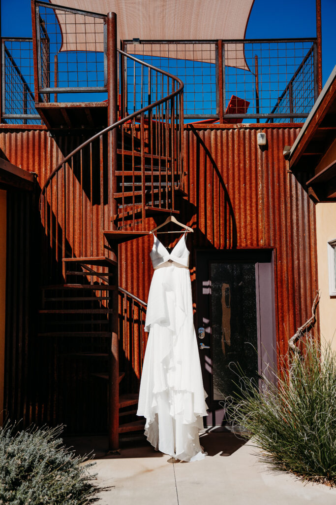 A Deadhorse Point elopement with a relaxed evening timeline, vineyard portraits, and an intimate sunset ceremony overlooking the canyon.