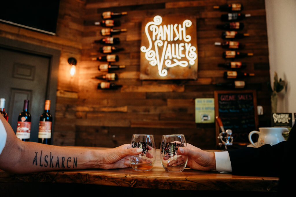 A Deadhorse Point elopement with a relaxed evening timeline, vineyard portraits, and an intimate sunset ceremony overlooking the canyon.