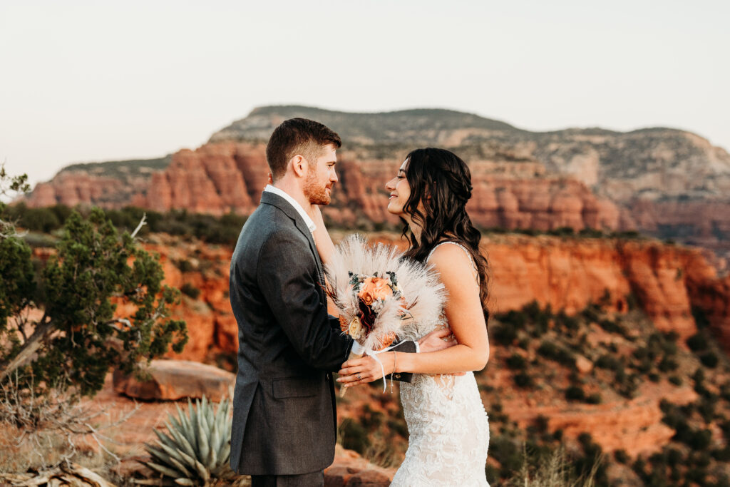 A Sedona adventure elopement featuring a sunrise hike, off-road Jeep experience, and sunset at Merry Go Round Rock.