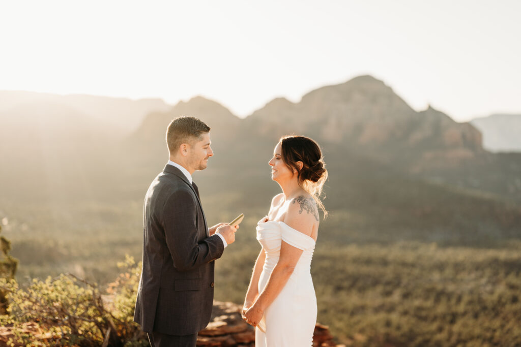 A backyard Sedona elopement with a sunrise hiking adventure and an intimate evening ceremony with family captured by Karen Castor Photography