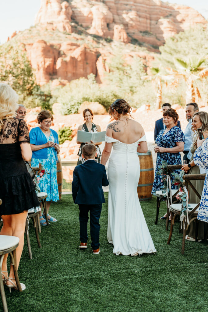 A backyard Sedona elopement with a sunrise hiking adventure and an intimate evening ceremony with family captured by Karen Castor Photography