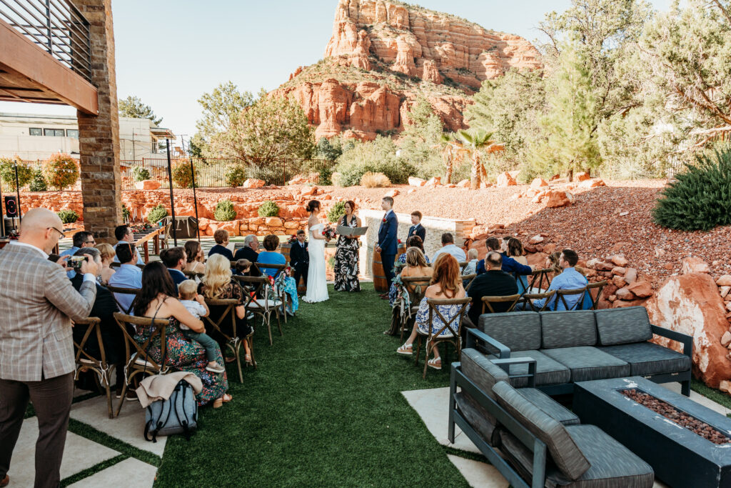 A backyard Sedona elopement with a sunrise hiking adventure and an intimate evening ceremony with family captured by Karen Castor Photography