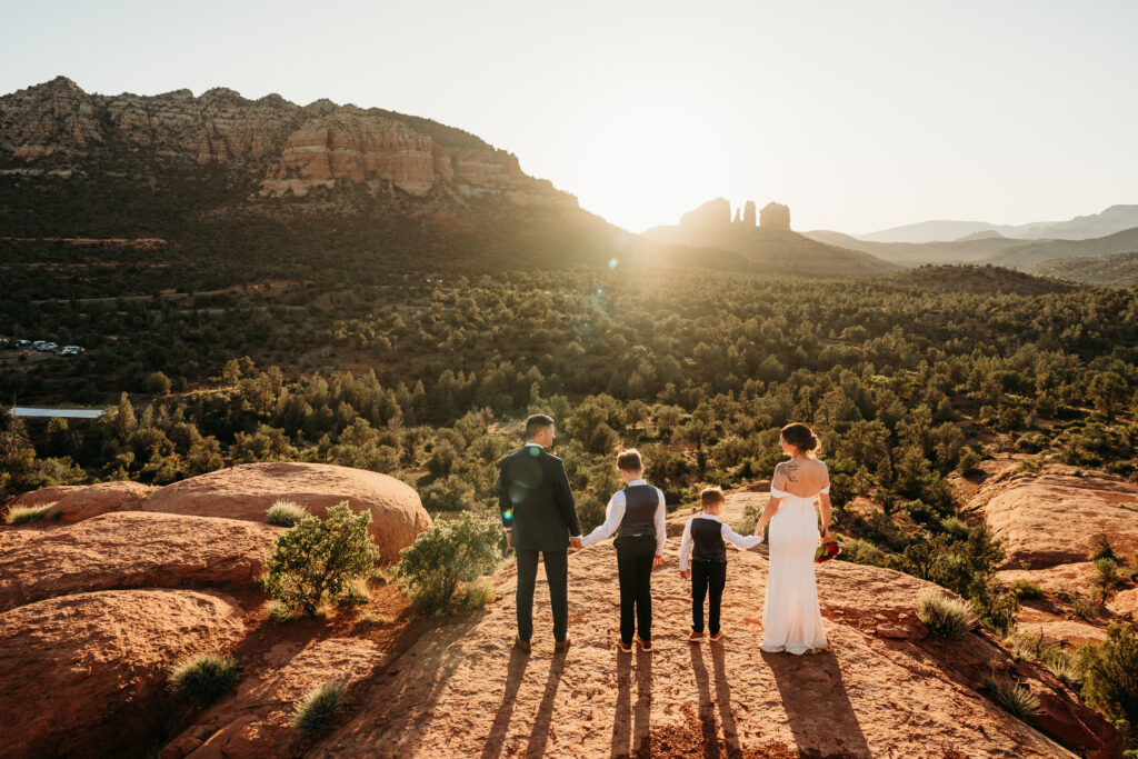 A backyard Sedona elopement with a sunrise hiking adventure and an intimate evening ceremony with family captured by Karen Castor Photography