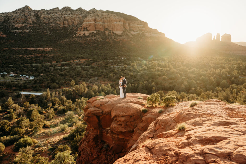 A backyard Sedona elopement with a sunrise hiking adventure and an intimate evening ceremony with family captured by Karen Castor Photography