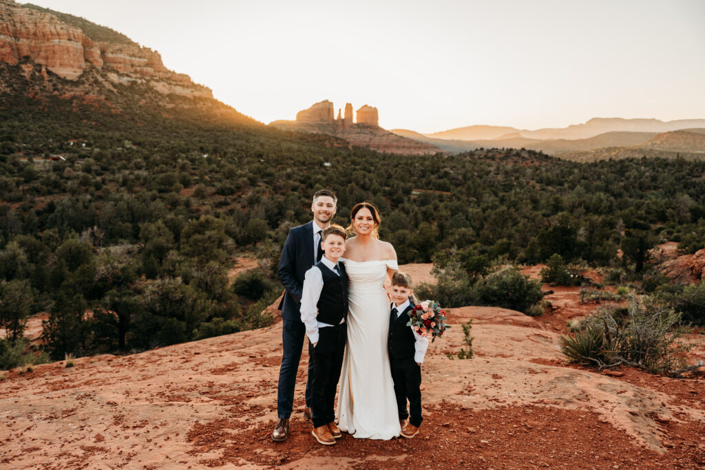 A backyard Sedona elopement with a sunrise hiking adventure and an intimate evening ceremony with family captured by Karen Castor Photography